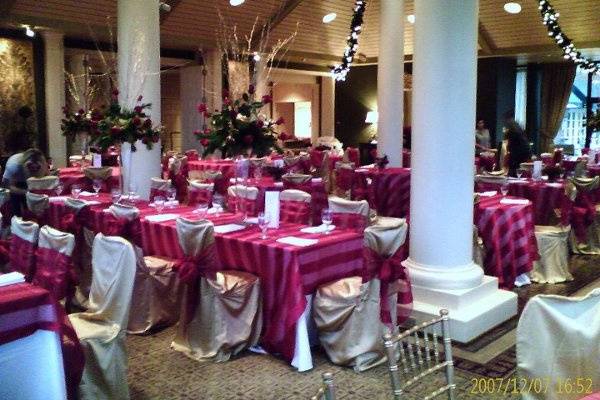 The Country Club of Little Rock was decorated with some of Party Time's fine linens, gold chiavari chairs, and chair covers (with sashes)!