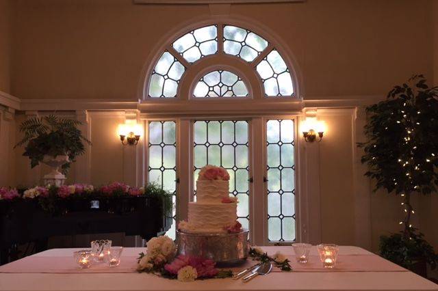 Stage in McPherson Room set up for cake cutting