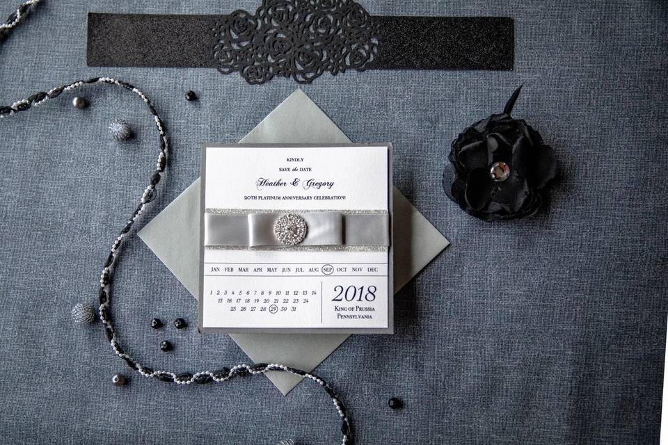 Invitation with ribbon and jem