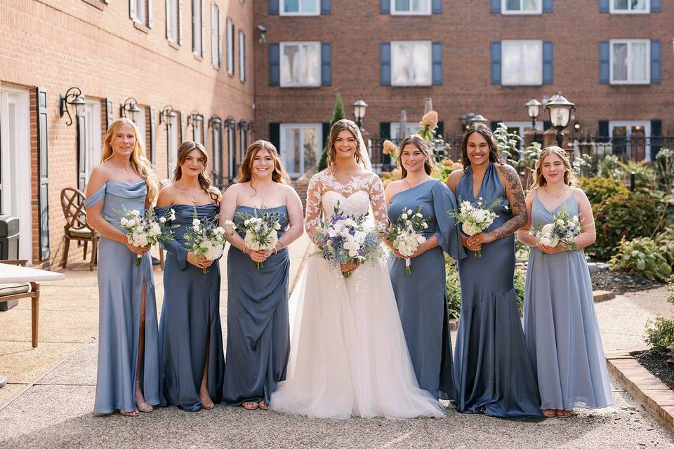 Groomsmen in courtyard