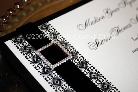 Black and white modern invite accented with a crystal square buckle and velvet ribbon