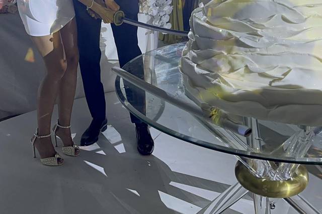 Newlyweds cutting the cake