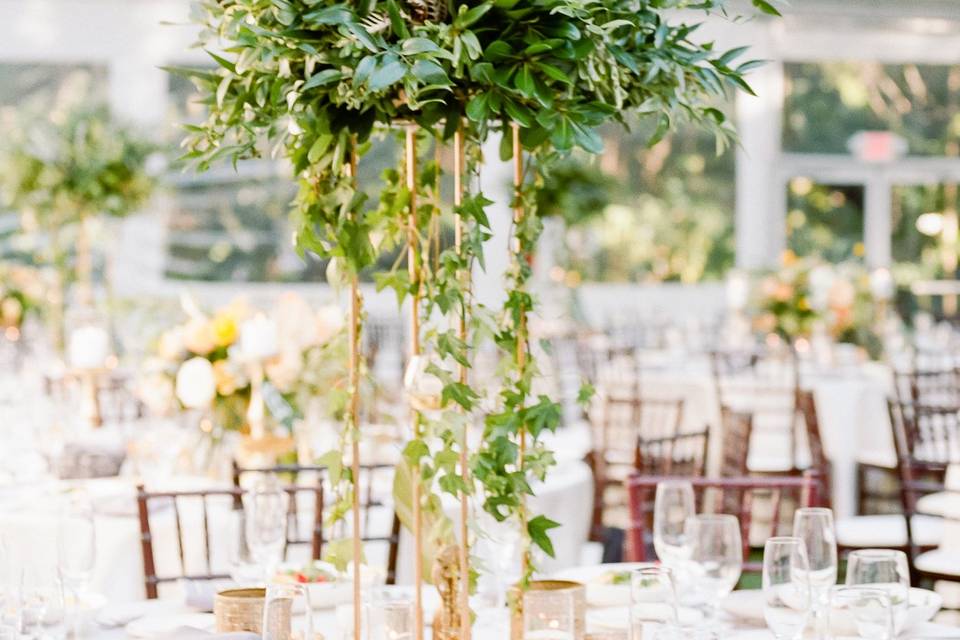 Tall lush greenery centerpiece