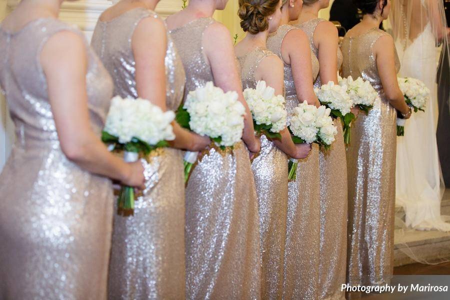 Bridesmaids behind the bride