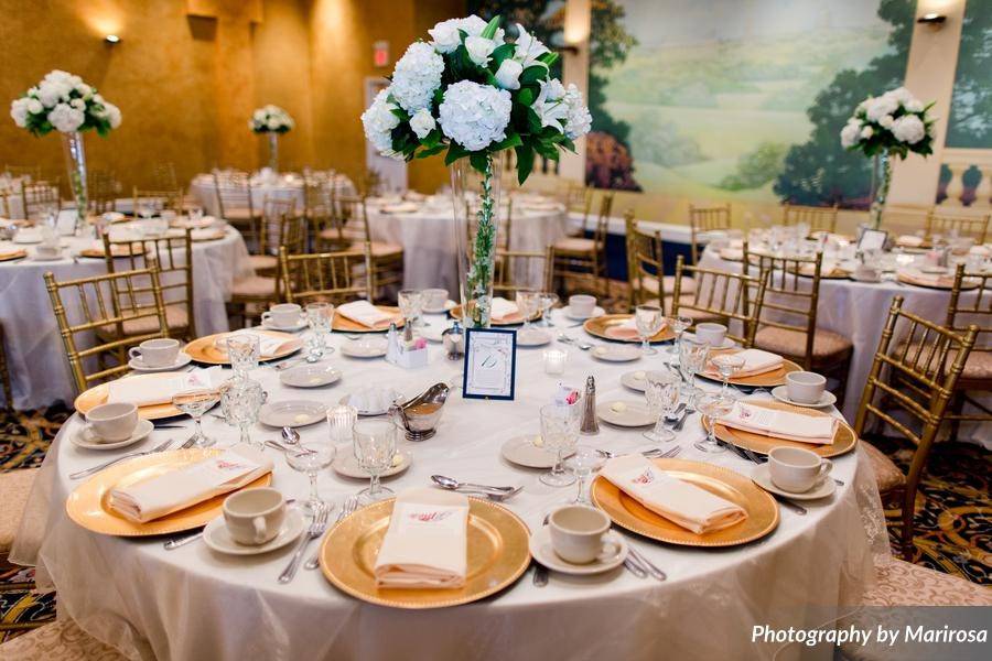 Table setting and raised floral centerpiece