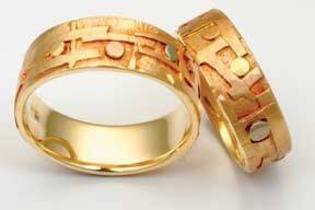 The Klimt Band.
14k and 18k gold custom handmade wedding bands available in yellow or white gold, with colored gold accents.