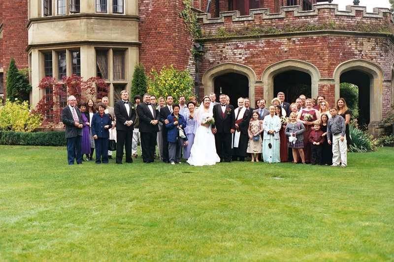 Couple's photo with the officiant