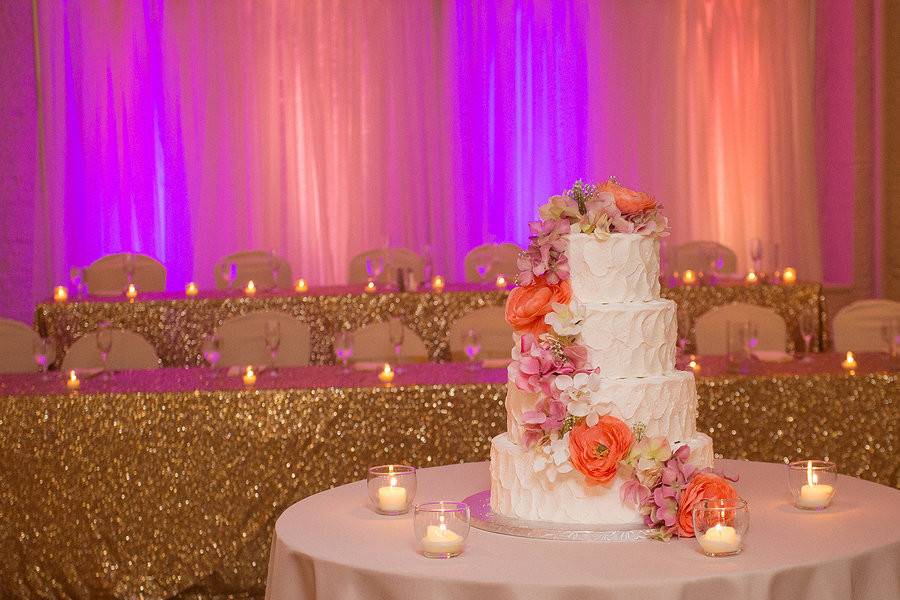 Candlelit head table and cake table