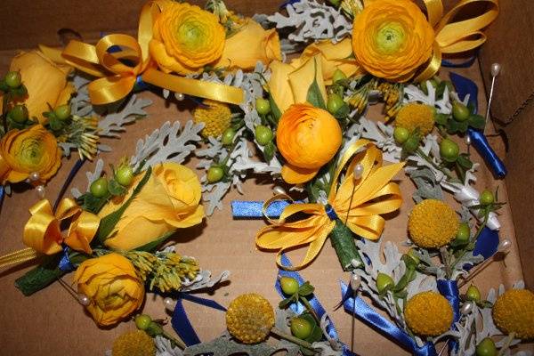 Bridal bouquet of ranunculus, lisianthus, freesia, stock and crespedium.  Photo by Dramatic Imaging.