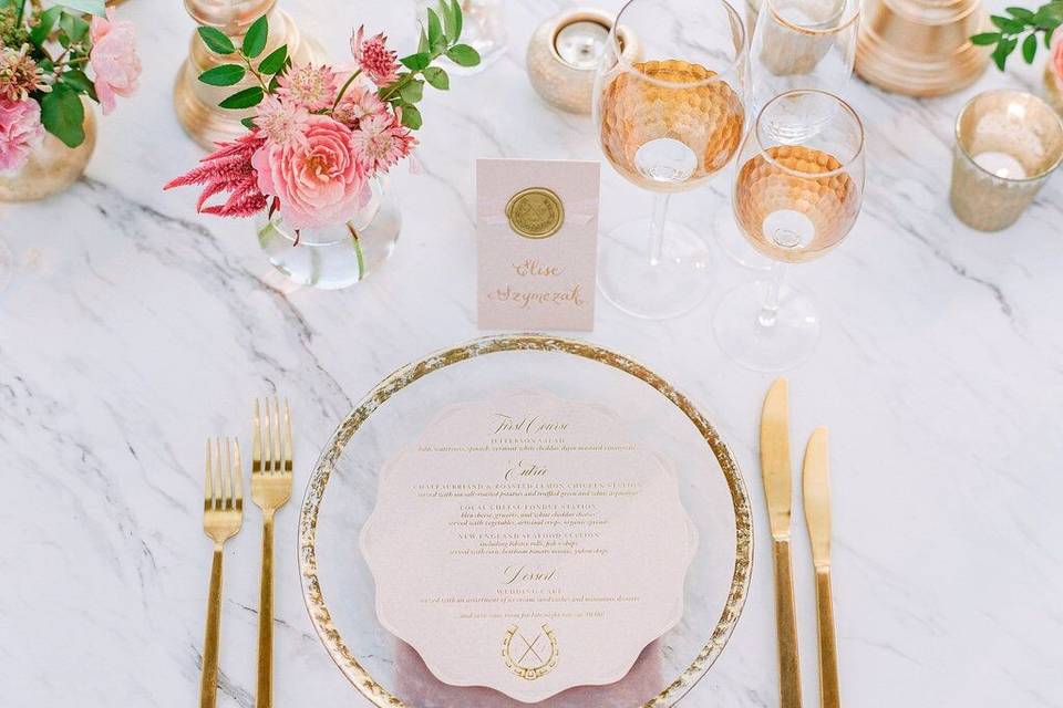 Pink and gold place setting