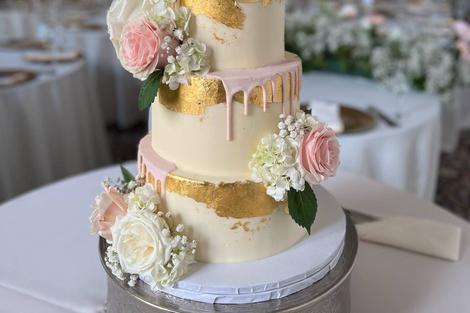 Tiered cake with edible gold