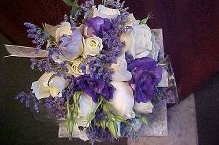 Vibrant purples and whites bridal bk.White roses, purple lisianthus.