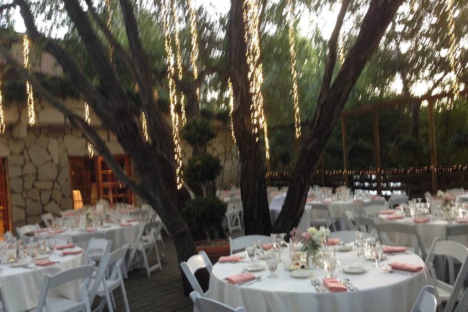 The table's are set for the reception at the Birchwood Room at Calamigos Ranch