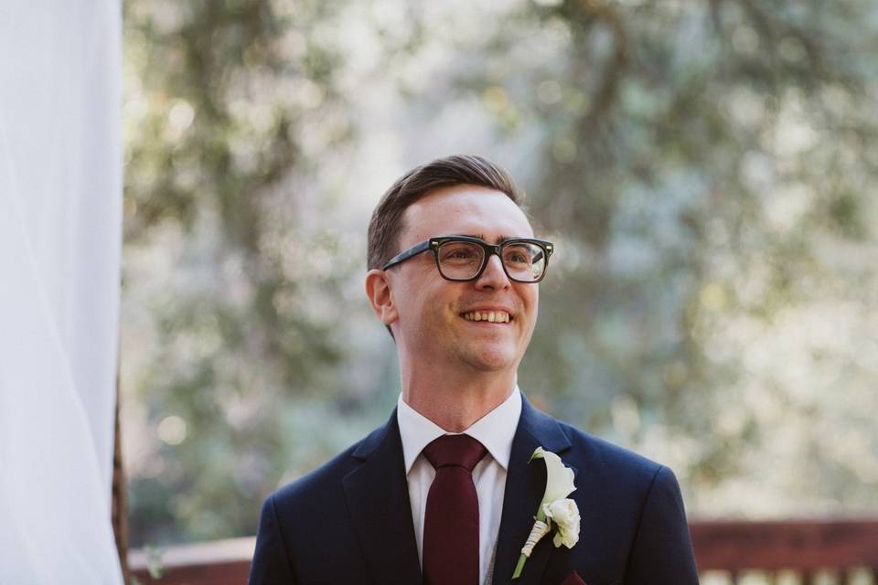 Groom smiling