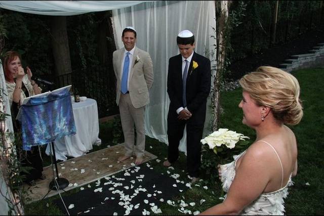 Welcoming the bride.