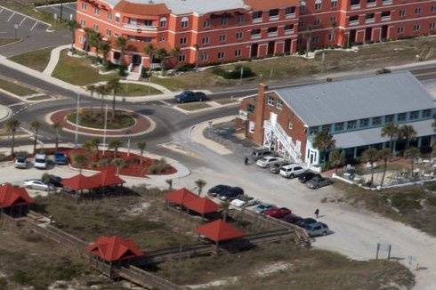 This view from the air allows you to see how close the hotel is to the actual beach...we are the pink building just across the street from the beach.