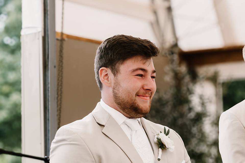 Groom tearing up