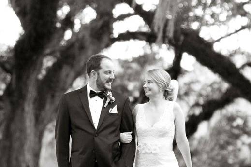 Real bride, Lauren, wears a custom lace bridal gown by Modern Trousseau Charleston.