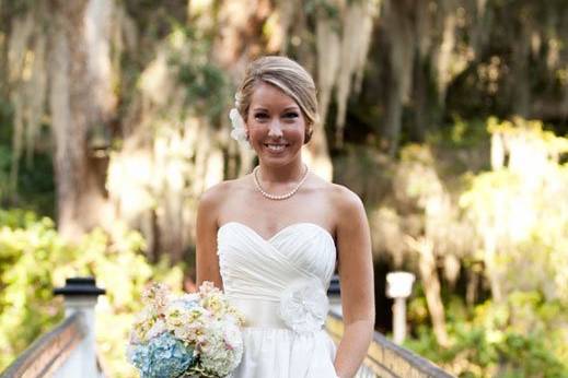 Real bride Kelly wears custom 'Michaela' gown by Modern Trousseau Charleston. Image courtesy of Carmen Ash.