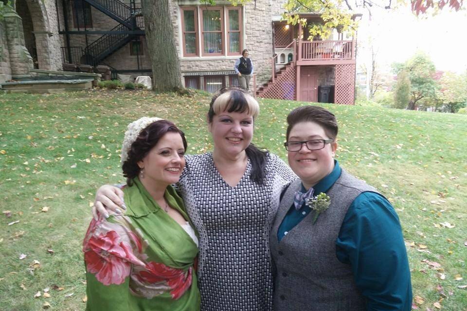 Officiant with the newlyweds