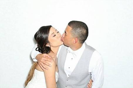 Newlyweds kissing