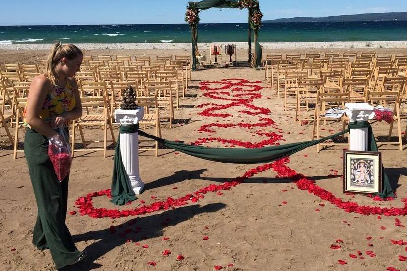 Decorating rose petal aisle