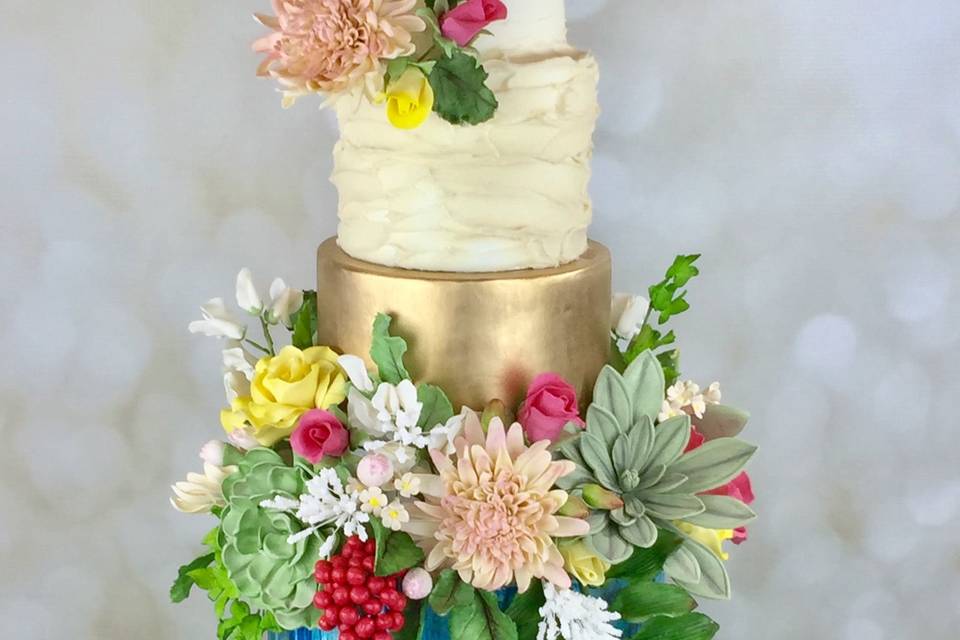 Rustic painted wood cake with sugar flowers