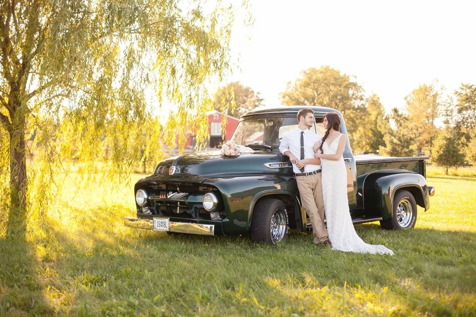 Couple beside car