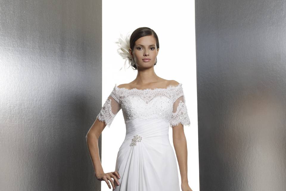 T630Short lace sleeves grace the shoulders on this Sheath style. The asymmetrically ruched bodice is embellished with a beaded lace medallion.
