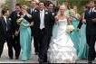 The couple with the bridesmaids and groomsmen