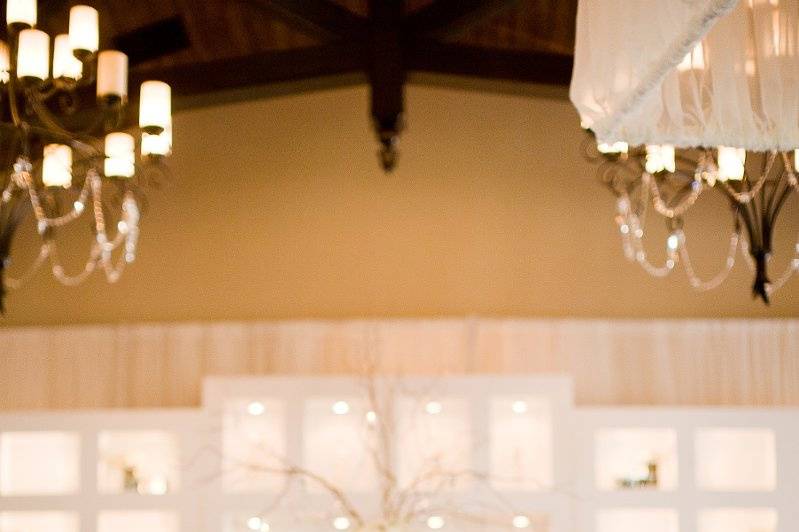 This reception featured our signature martini bar (background) and our elegant mirrored sweetheart table. The reception was held at cross water hall, nocatee - ponte vedra, florida