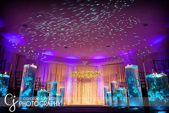 This ceremony was designed inside the riverhouse at st augustine, florida. The ceremony was set in the same room as the reception and was transformed to the reception look during the cocktail hour