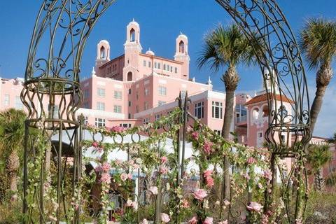 Our gated arbor with gates blooming from the creative hands of our floral design team. A perfect confection for a back drop... The historic very pink don cesar hotel