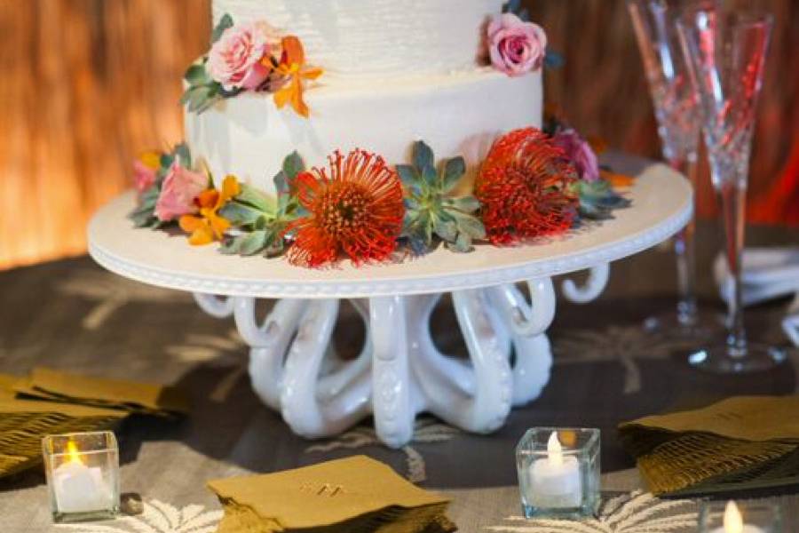 Octopus cake stand with thatched palm wall and ocean elements surf club reception ponte vedra inn