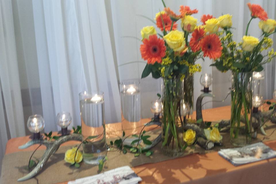 Long estate table antler and fall accent floral centerpiece