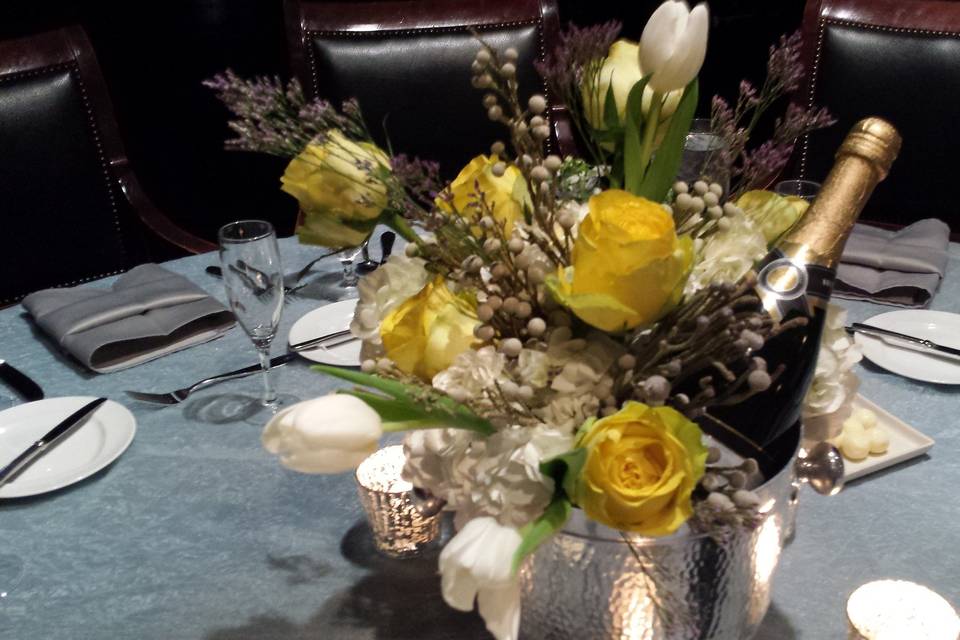 Champagne and roses centerpiece