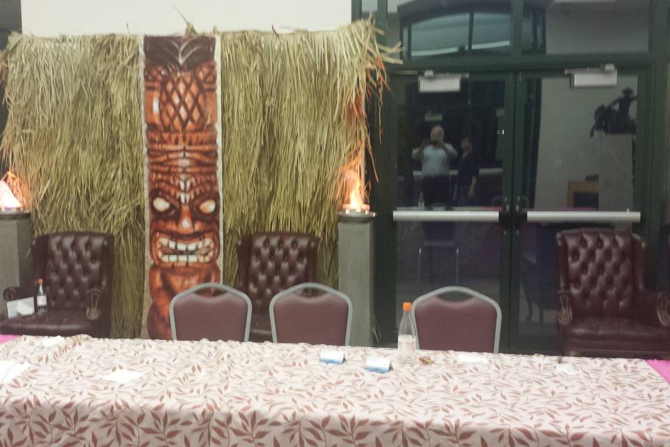 Luau tiki and grass wall