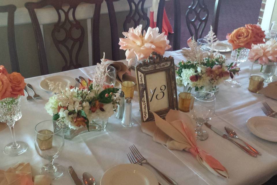 Coral peonies and floral table accents