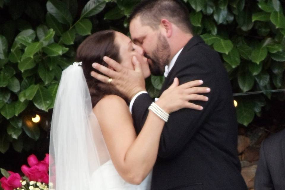 Couple's wedding kiss