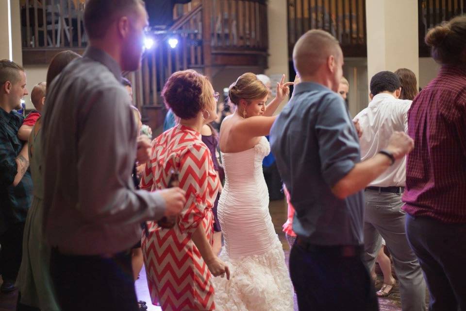 Bride with her guests' dancing