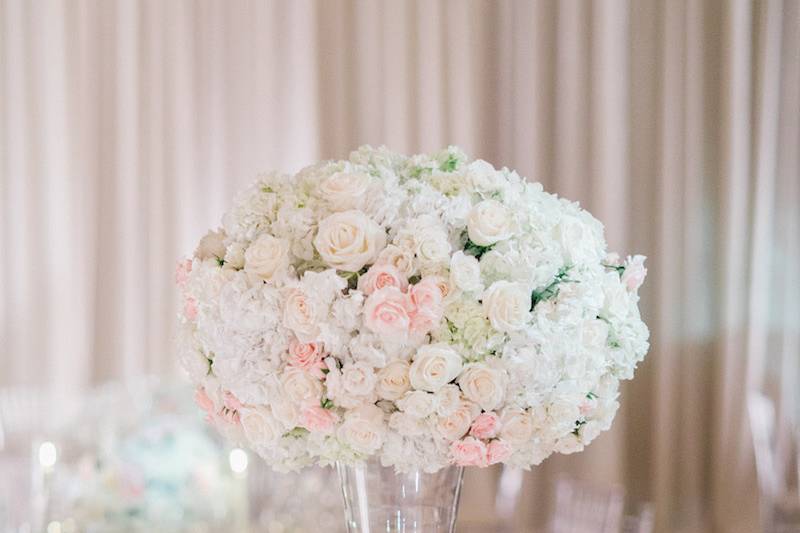 White cake with pink flowers