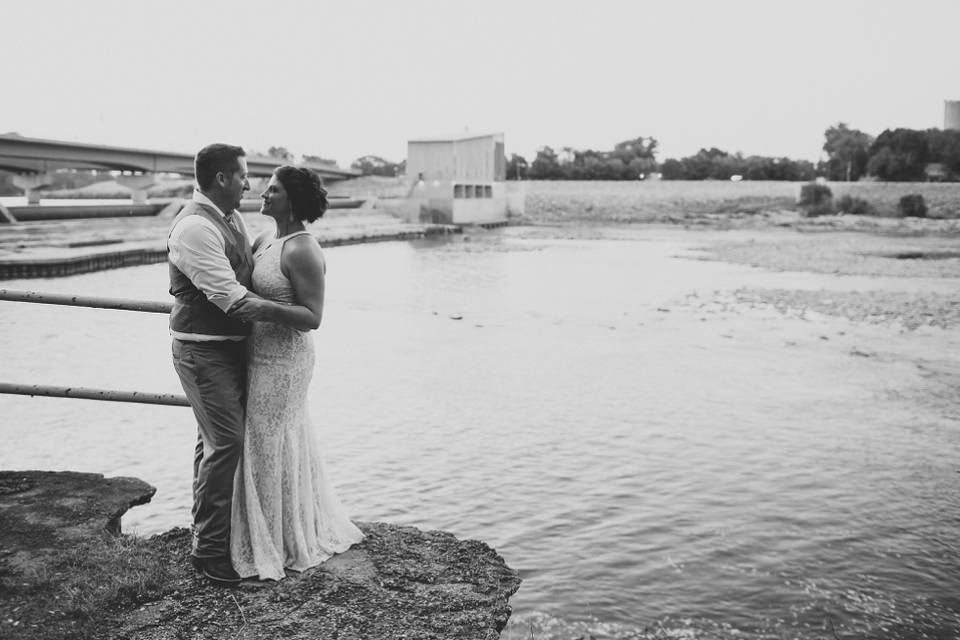 Happy couple by the water