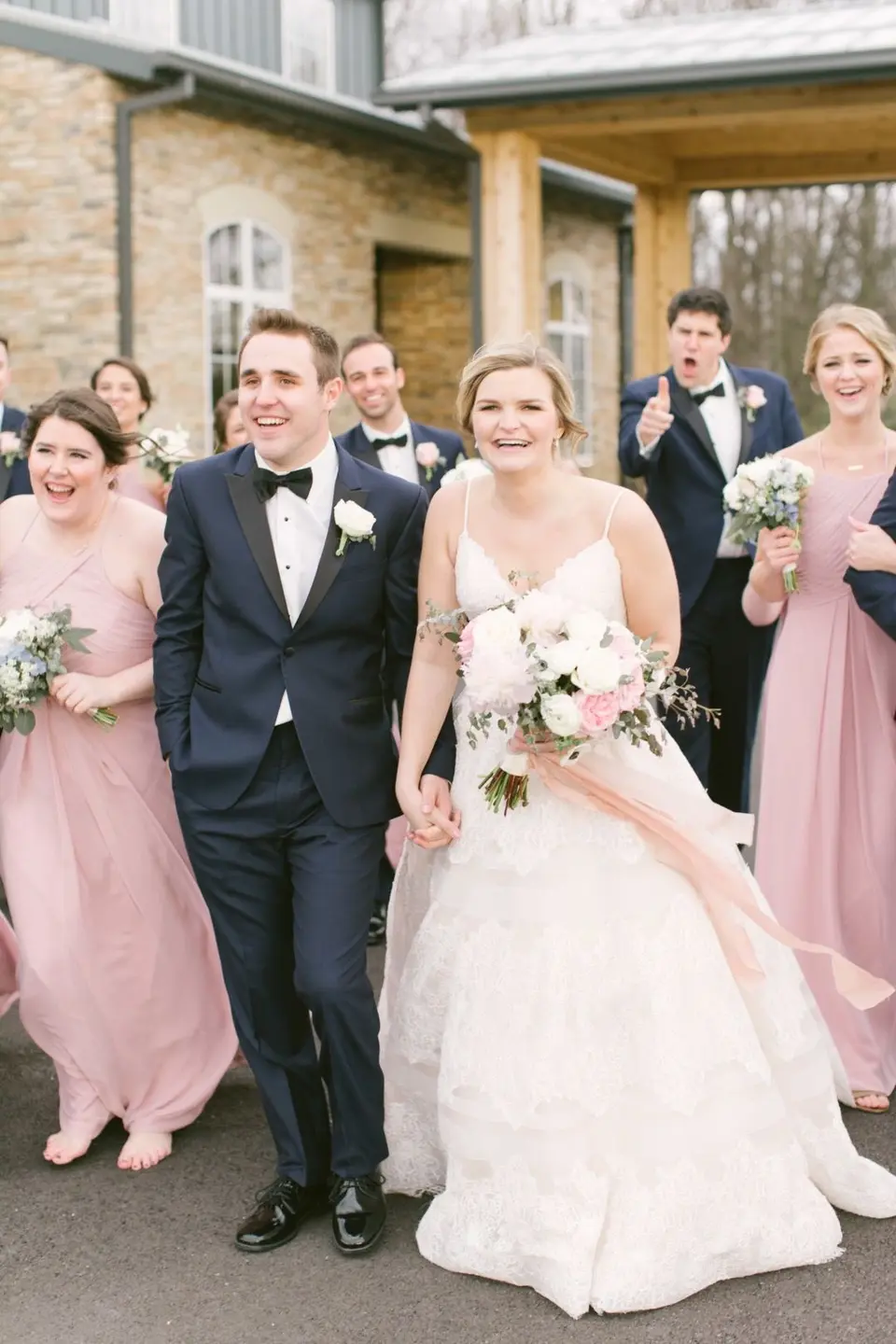 The couple together with their bridesmaids and groomsmen