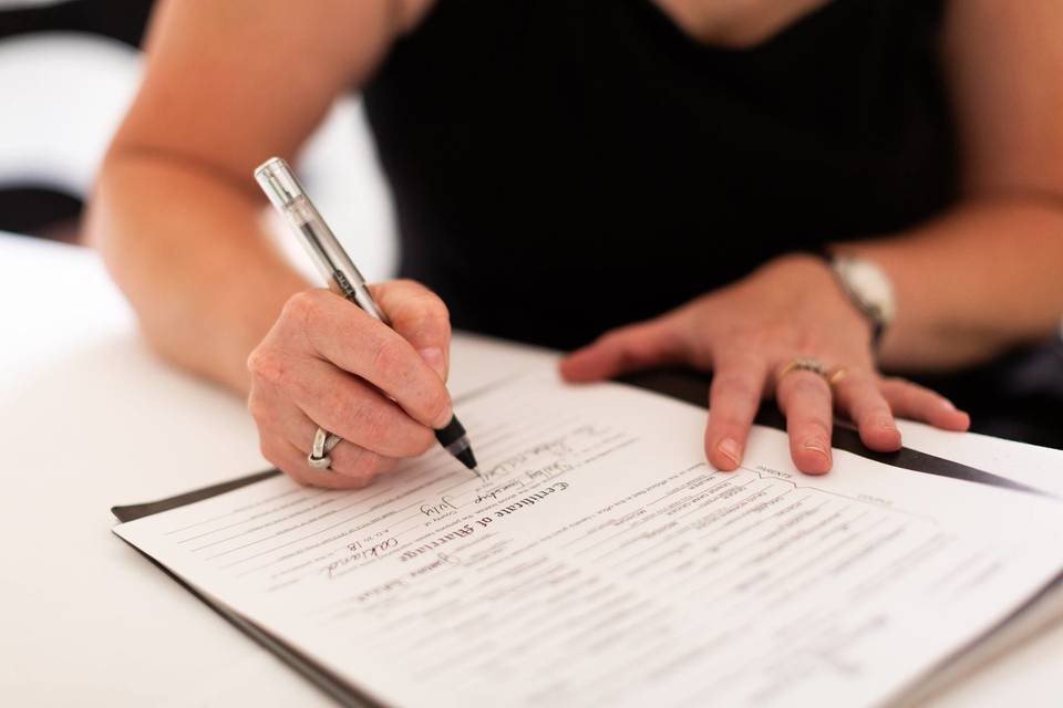 Signing the marriage certificate