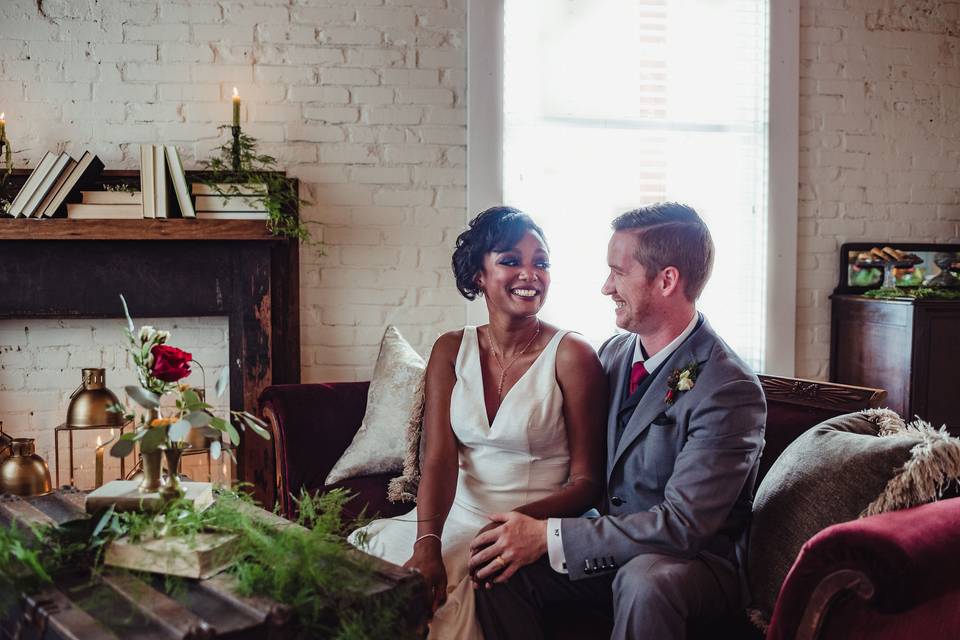 Newlyweds on the couch | Photo by Rose Trail Images