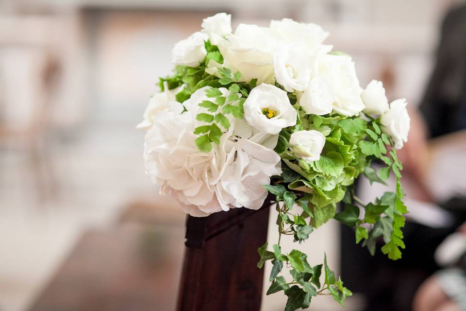 Hydrangeas and roses for the pews