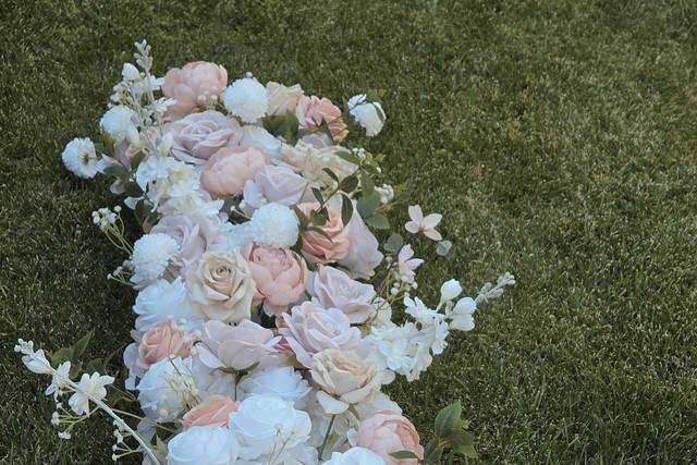 Sunset aisle flowers