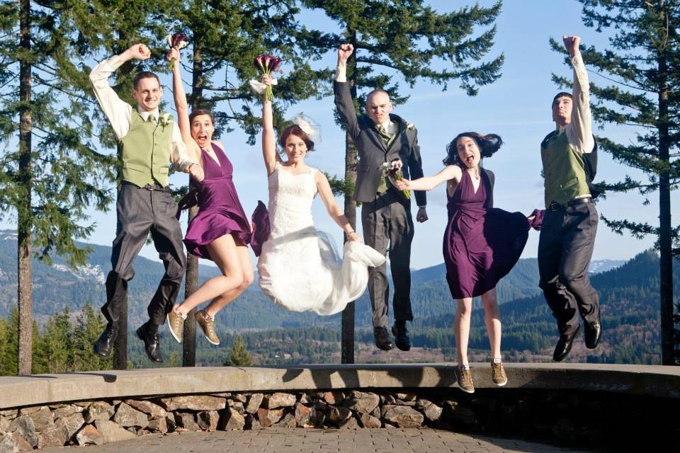 The couple with the bridesmaids and groomsmen