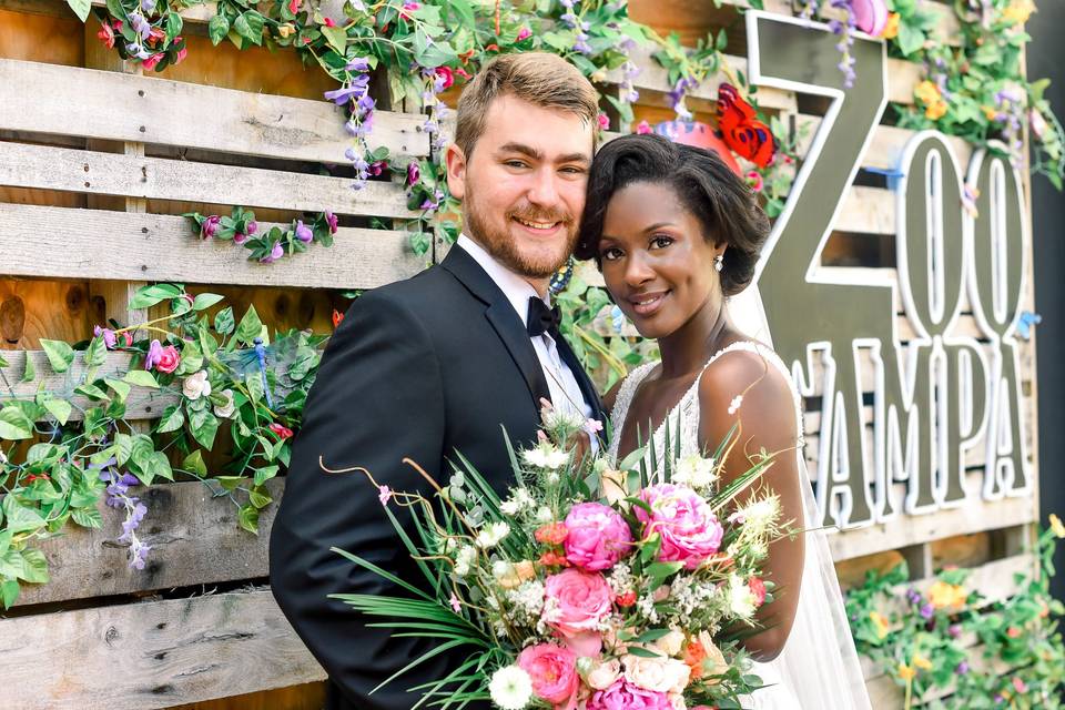 Bride and Groom near sign