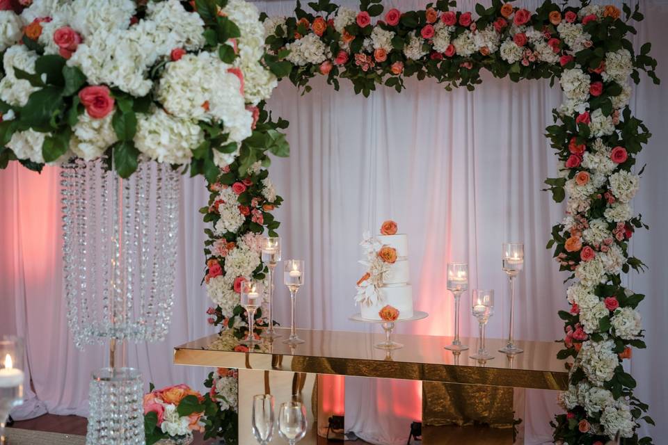 Living coral floral arch